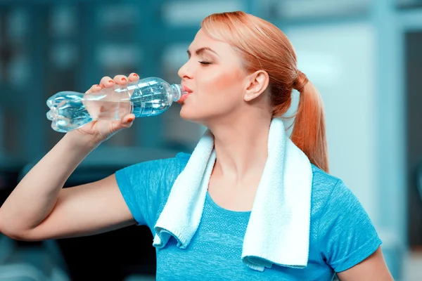 Attractive mature woman at sports club Royalty Free Stock Photos