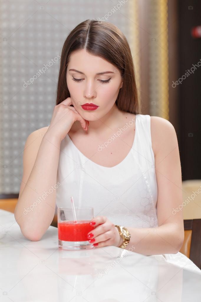 Woman sitting in the bar