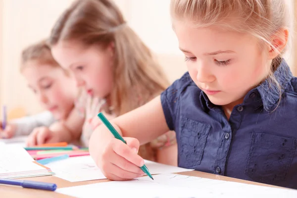 Close up of little girl drawing Stock Image