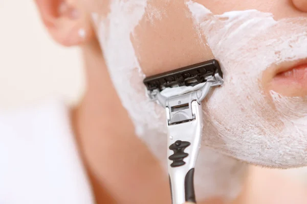 Close up of shaving man — Stock Photo, Image
