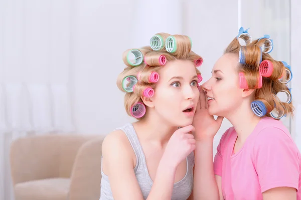 Young girls sharing secrets — Stock Photo, Image