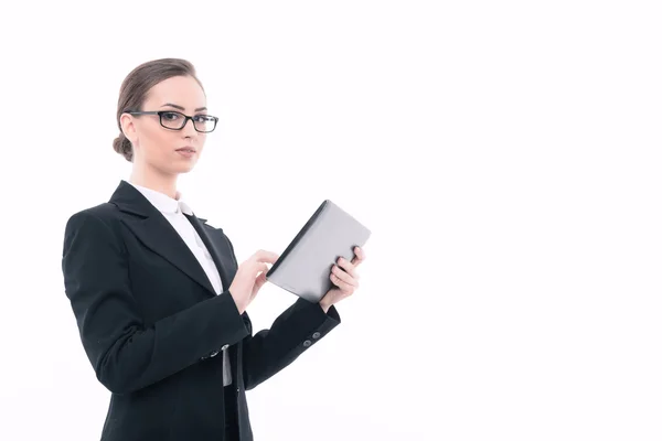 Beautiful woman with tablet in formal clothes — Stock Photo, Image