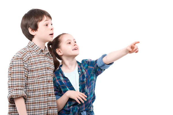 Brother and sister watching something — Stock Photo, Image