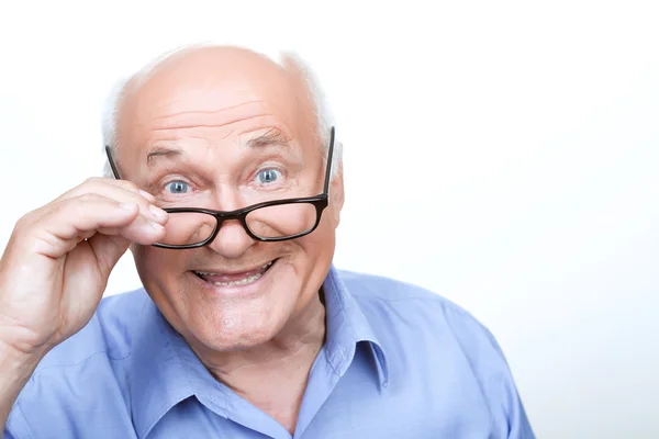 Nice grandfather touching spectacles — Stock Photo, Image