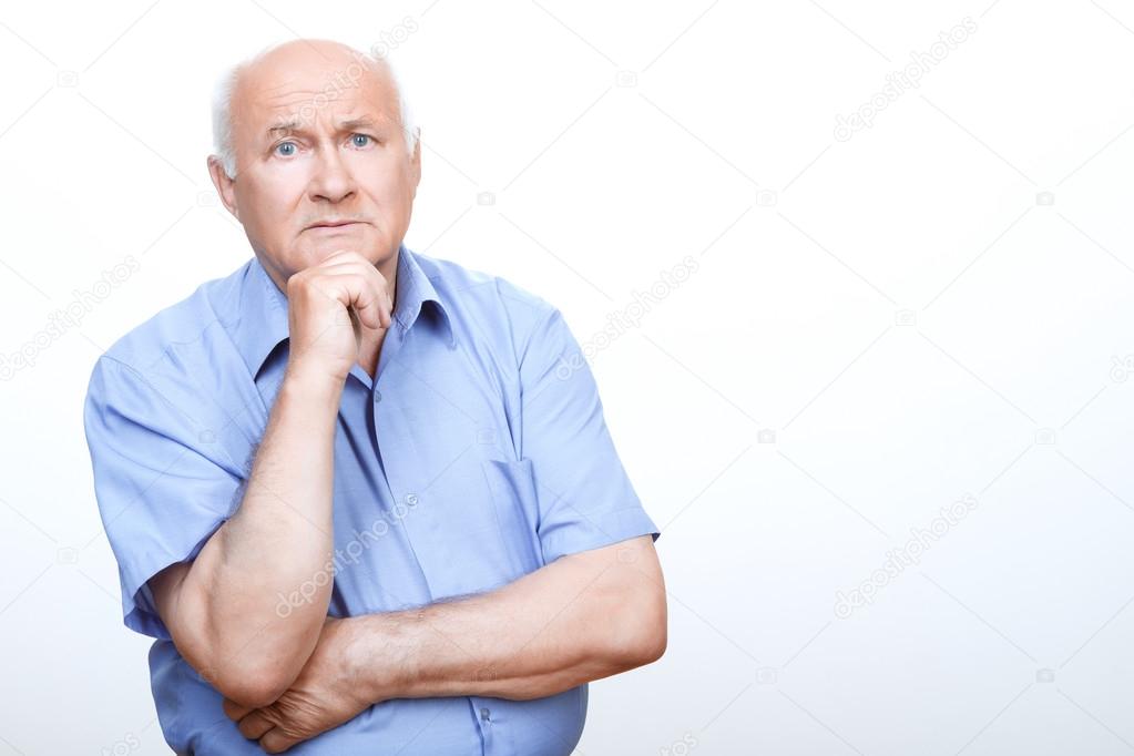 Puzzled grandfather involved in thinking