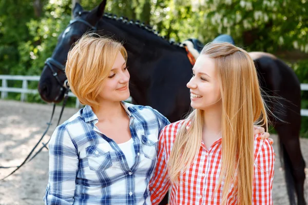 Smiling sister embracing with each other — Stock Photo, Image