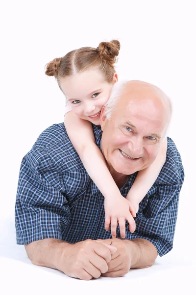 Grandfather having fun with his granddaughter — Stock Photo, Image