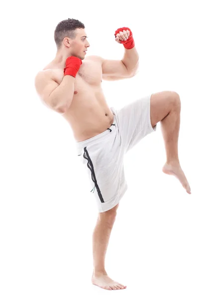 Muscled man doing exercises — Stock Photo, Image