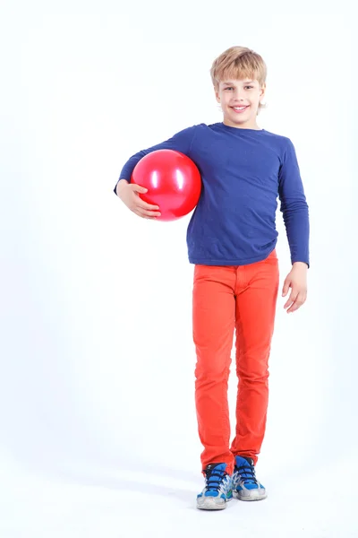 Cheerful boy holding the ball — Stock Photo, Image