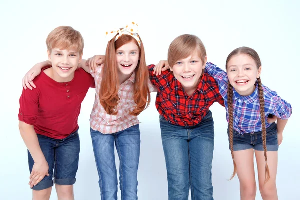 Brightly dressed children smiling — Stock Photo, Image