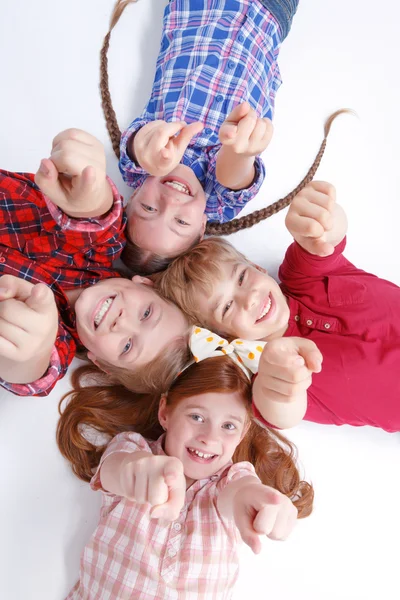 Top view of children lying on the floor — Stock Photo, Image