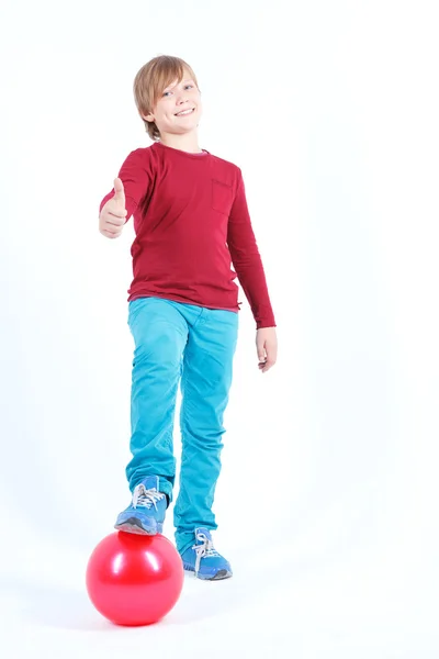 Cheerful boy holding the ball — Stock Photo, Image