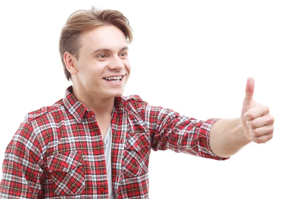 Young man thumbing up on white background — Stock Photo, Image