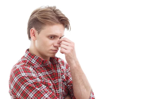 Anxious guy touching his head — Stock Photo, Image