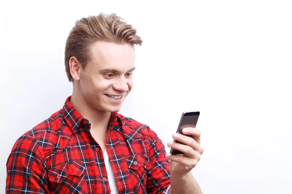 Nice guy holding the mobile phone — Stock Photo, Image