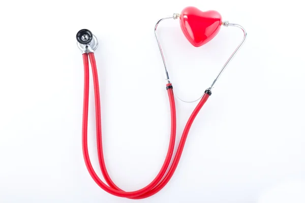 Close up of stethoscope and heart — Stock Photo, Image