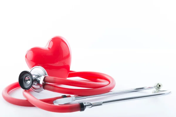 Close up of stethoscope and heart — Stock Photo, Image