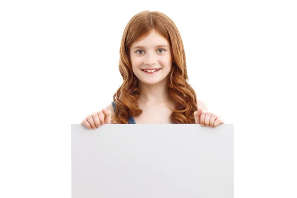 Dziewczynka gospodarstwa biały deska — Zdjęcie stockowe