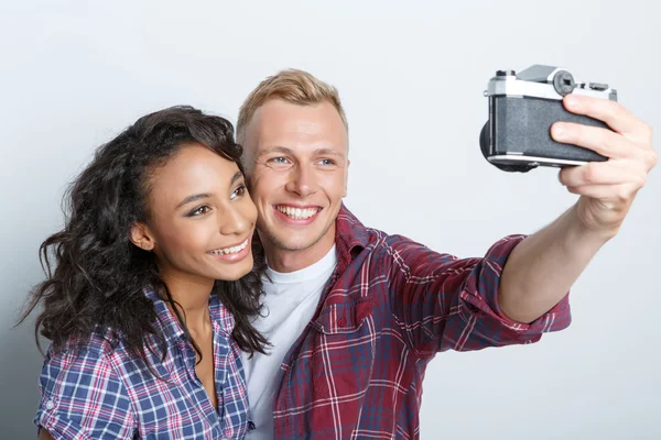 Lovely couple isolated on grey — Stock Photo, Image