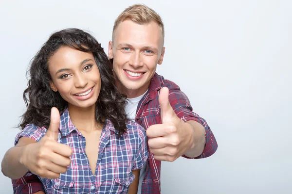 Lovely couple isolated on grey — Stock Photo, Image