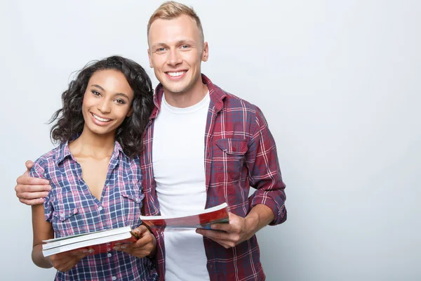 Lovely couple isolated on grey — Stock Photo, Image