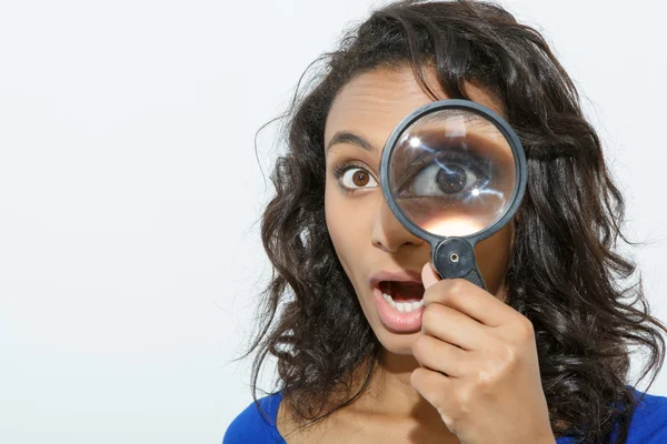 Funny girl with loupe — Stock Photo, Image