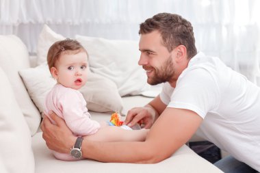 Positive daddy playing with kid