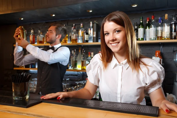 Bartender and a waitress during work — Stock Photo, Image