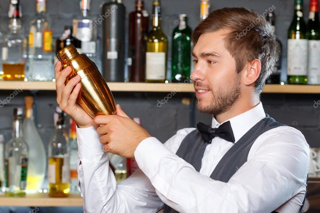 Bartender mixing drinks