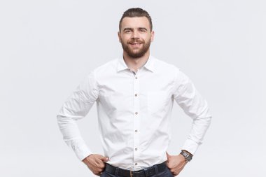 Handsome man with hands on his hips 