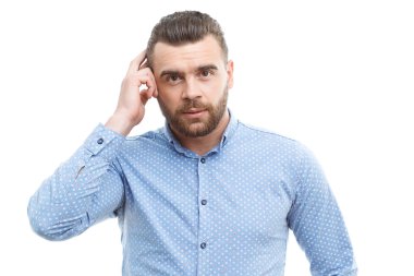 Man touching his head with hand 