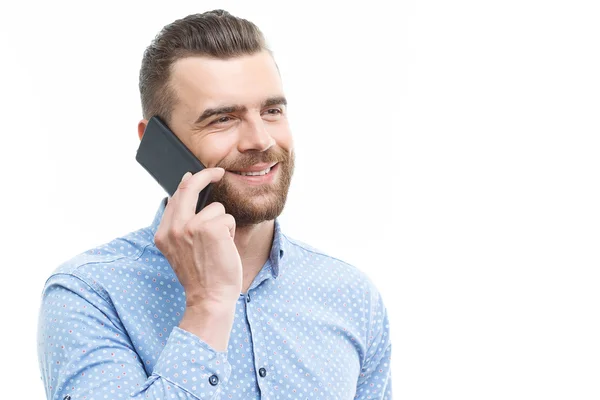 Bonito homem falando por telefone móvel — Fotografia de Stock