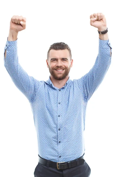 Cheering man with raised arms — Stockfoto