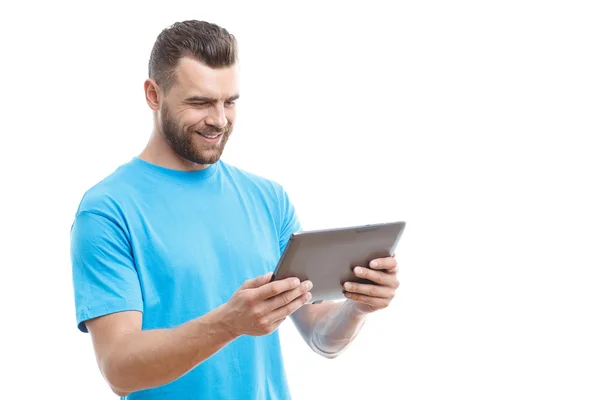 Man with beard holding tablet — Stok fotoğraf