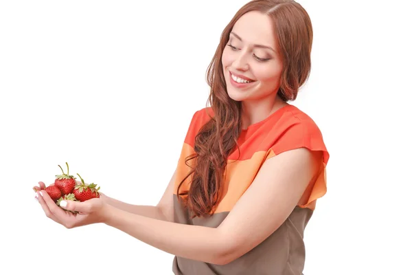 Red-haired woman holding strawberries — Stock Photo, Image