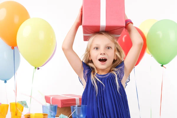 Cheerful girl holding present box Stock Image