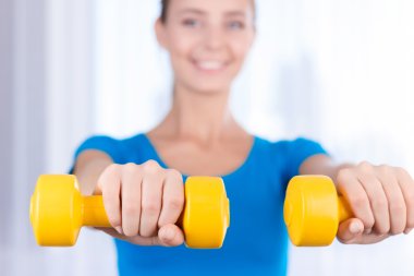 Happy girl doing exercises