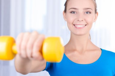Happy girl doing exercises