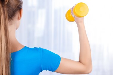 Happy girl doing exercises