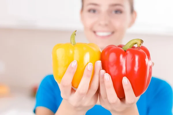 Nice girl holding vegetables — Stok fotoğraf