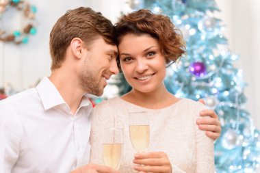 Loving couple drinking champagne