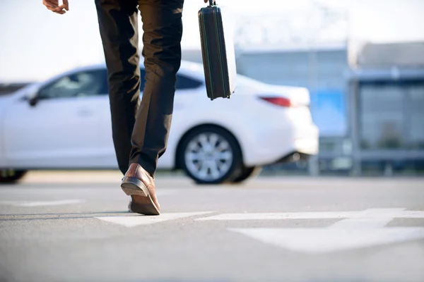 Stylish businessman holding case — Stock Photo, Image