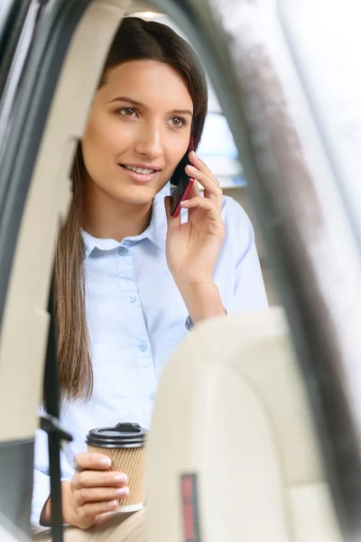Nice girl sitting in the car — Stock Photo, Image