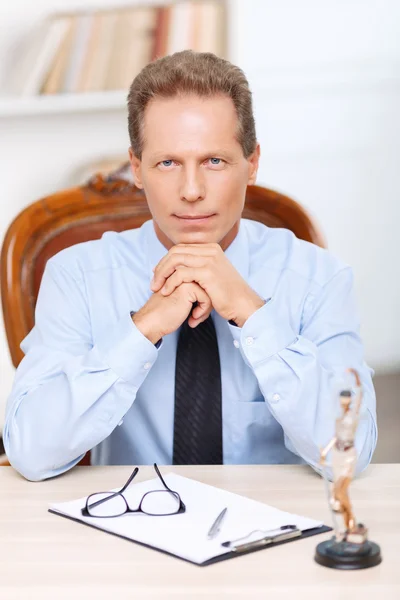 Professional lawyer sitting at the table — Stock Photo, Image