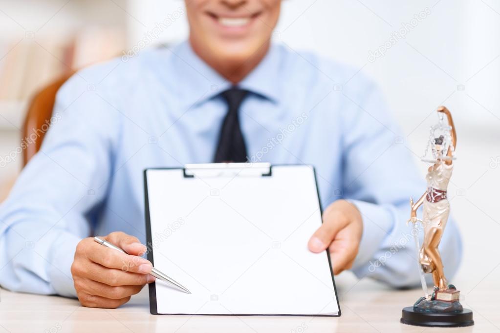 Professional lawyer holding folder