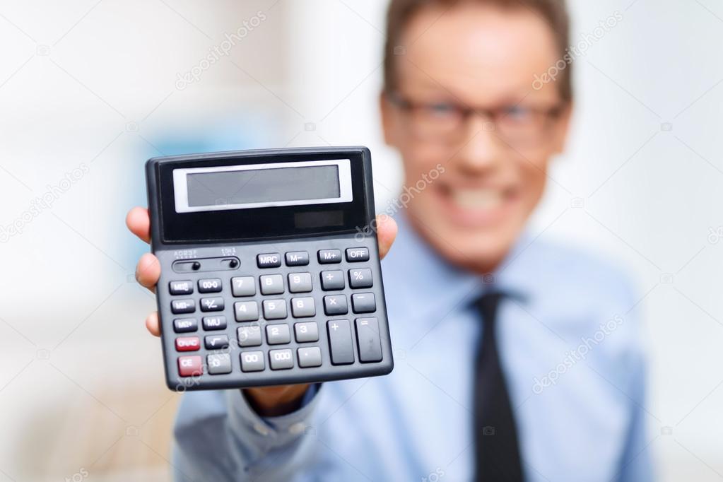 Professional lawyer holding calculator