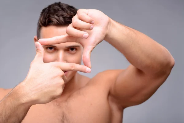 Pleasant guy expressing emotions — Stock Photo, Image