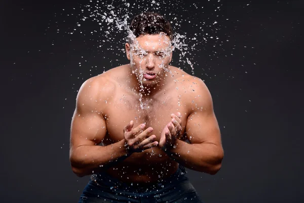 Handsome guy taking shower — Stock Photo, Image