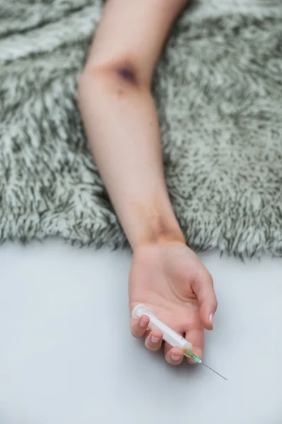 Desperate girl lying on the floor — Stok fotoğraf