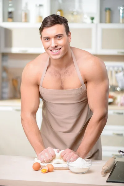 Tough looking guy makes a batch — Stock Photo, Image